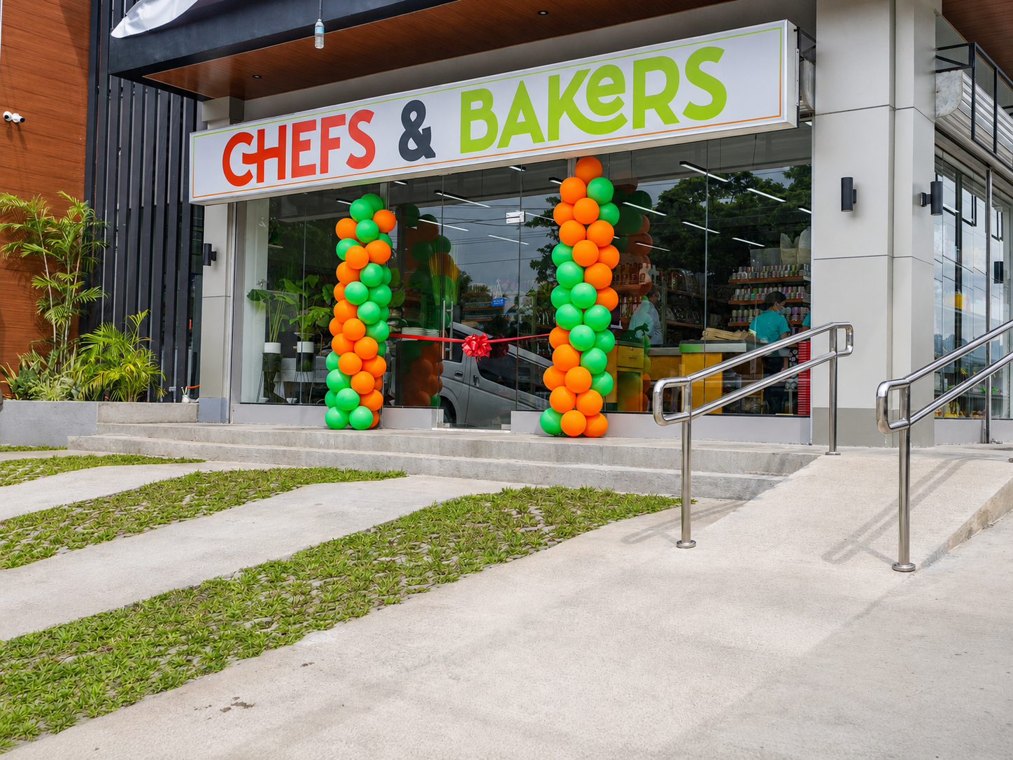 A Chefs and Bakers branch on opening day, with balloon columns at the glass doors